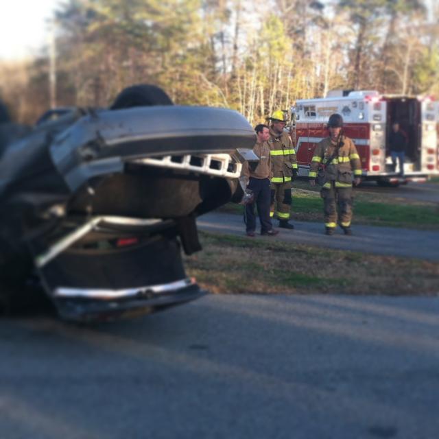 Squad crew on overturned vehicle